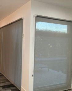 Modern Simi Valley living room with high quality screen shades installed on roller doors and windows, fully closed for privacy.